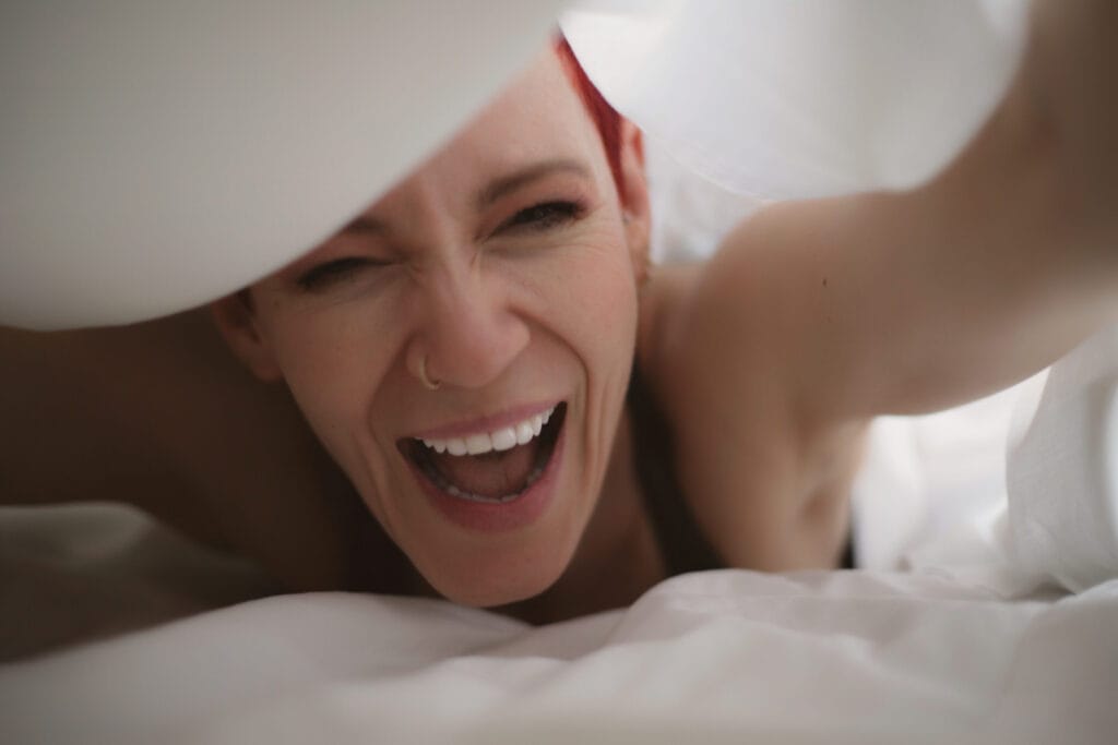 an image of Tanya photographer at house of secrets who works with mens boudoir photography