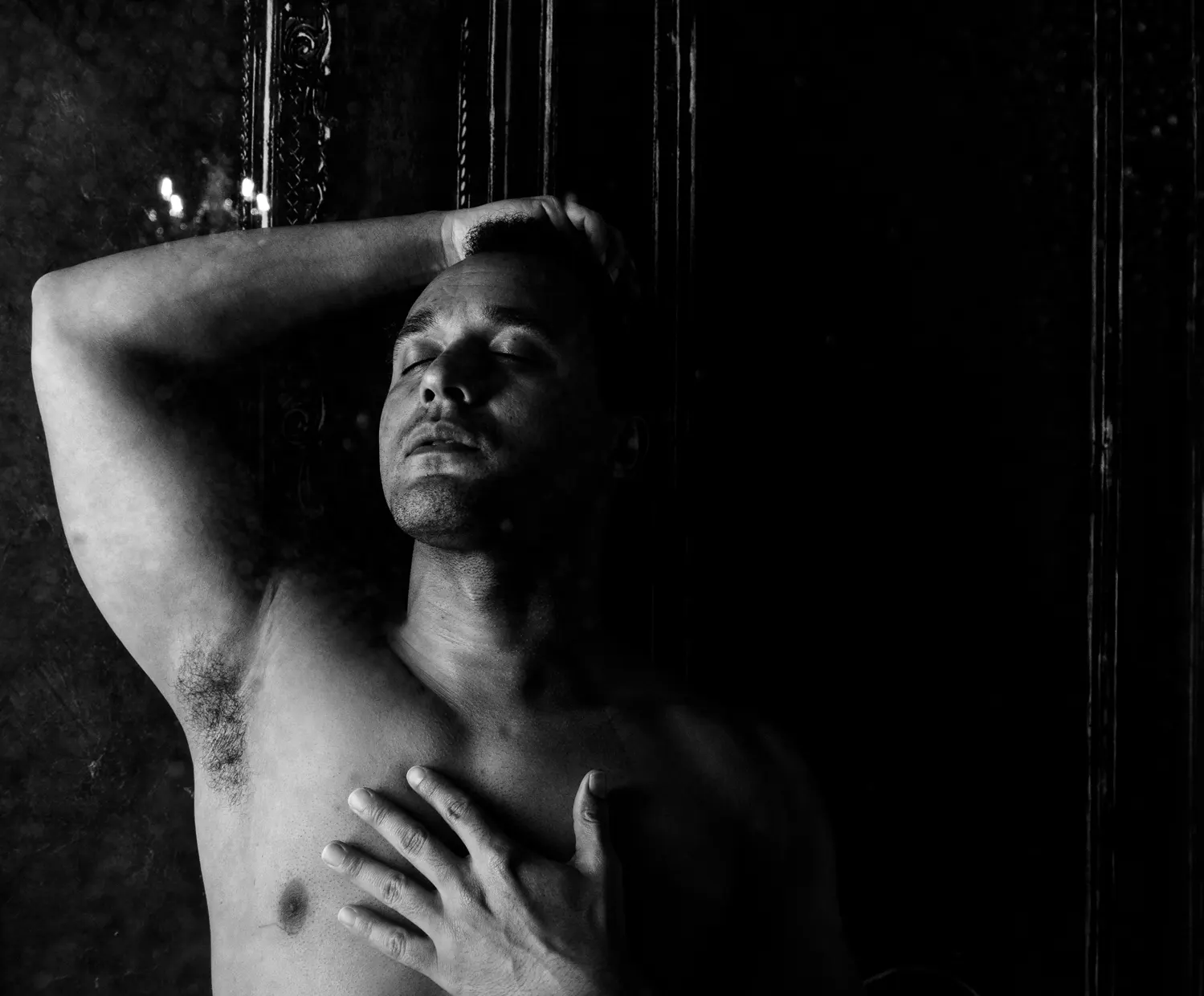 a black and white image of groom's boudoir photography in austin tx